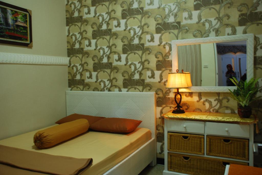 Griya Nelwan Guest House Malang Szoba fotó